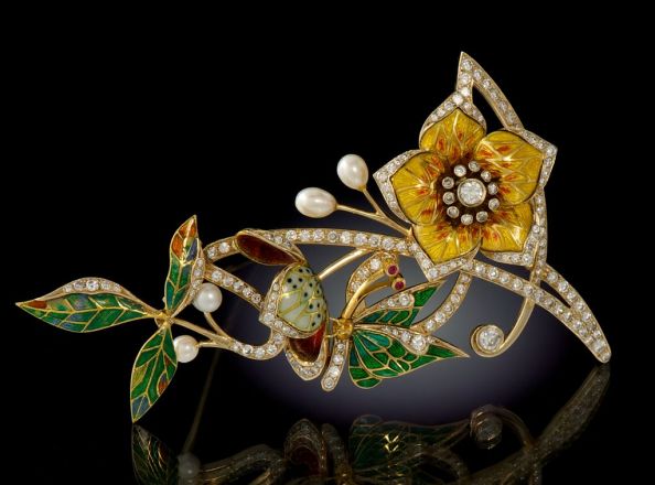 A_Large_Gold_Diamond_and_Enamel_Flower_Brooch.jpg