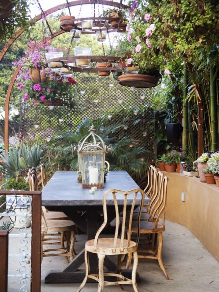 CI-sandy-koepke_photog-jennifer-cheung-patio-hanging-plants-candles-flowers-arbor_s3x4_lg.jpg