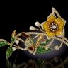 A_Large_Gold_Diamond_and_Enamel_Flower_Brooch.jpg