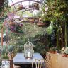 CI-sandy-koepke_photog-jennifer-cheung-patio-hanging-plants-candles-flowers-arbor_s3x4_lg.jpg